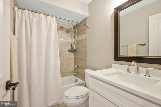 bathroom featuring toilet, vanity, and shower / bathtub combination with curtain