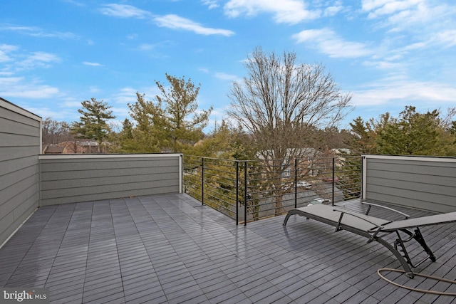 view of patio featuring a balcony