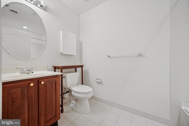 bathroom with visible vents, toilet, tile patterned flooring, baseboards, and vanity