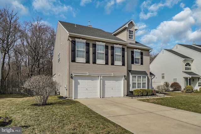 view of front of house with an attached garage, concrete driveway, and a front lawn