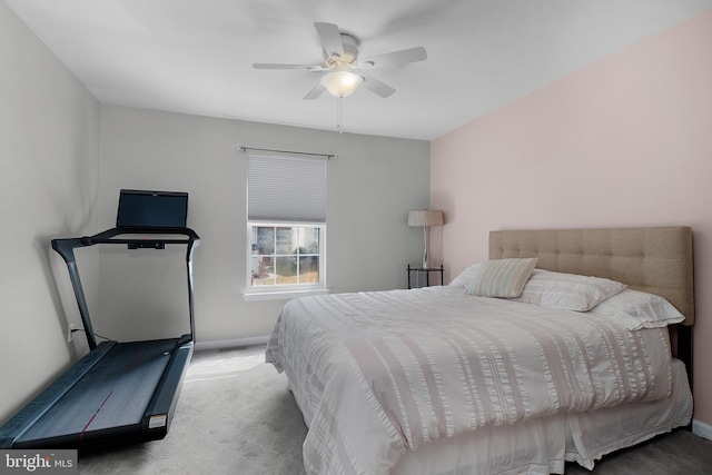 bedroom with baseboards, carpet, and a ceiling fan