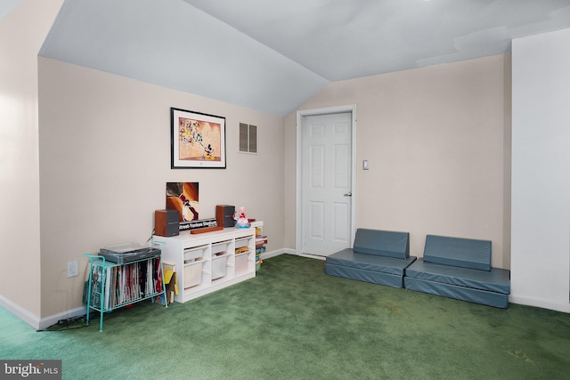 playroom featuring visible vents, carpet flooring, baseboards, and lofted ceiling