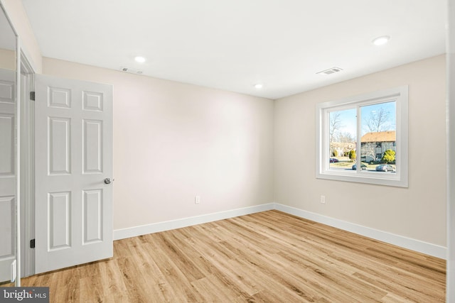 unfurnished bedroom with recessed lighting, visible vents, baseboards, and wood finished floors