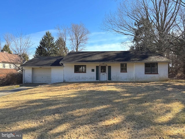 single story home featuring a garage