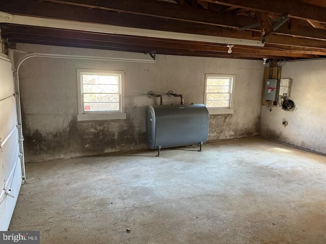 1002 N New St, West Chester, PA 19380 - below grade area with electric panel, a garage, and heating fuel