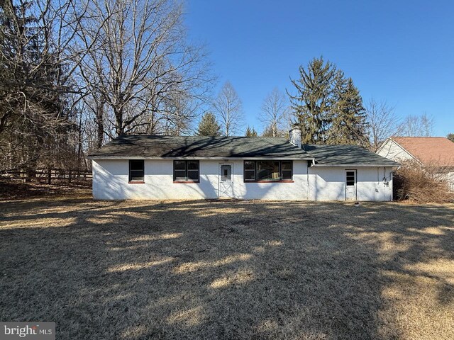 1002 N New St, West Chester, PA 19380 - rear view of house featuring a yard