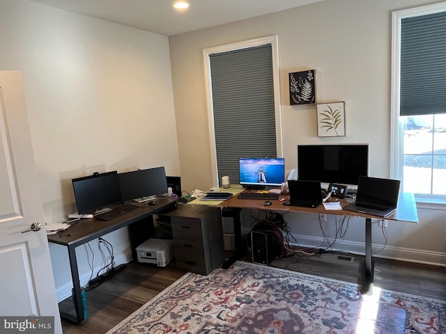 office space featuring dark wood-style floors, recessed lighting, and baseboards