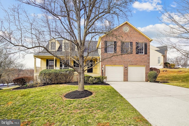 view of front facade with brick siding, an attached garage, a front lawn, covered porch, and driveway