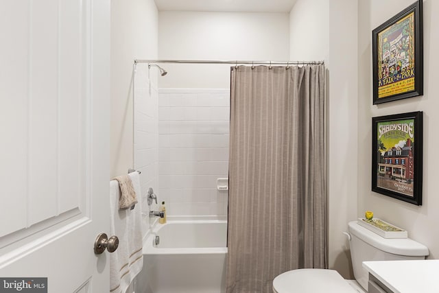 full bathroom featuring shower / bathtub combination with curtain, toilet, and vanity