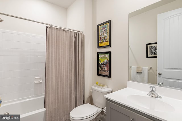 bathroom with vanity, toilet, and shower / bathtub combination with curtain