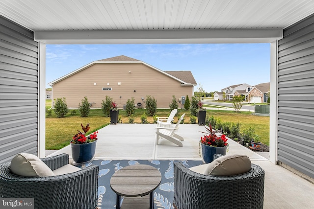 view of patio with a residential view