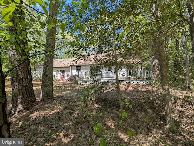 exterior space featuring a deck