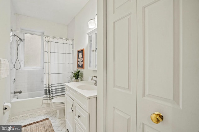 bathroom featuring vanity, toilet, shower / bath combo, and tile patterned flooring