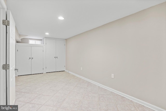 below grade area featuring recessed lighting and baseboards