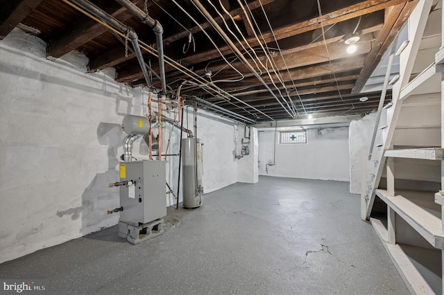 basement featuring gas water heater