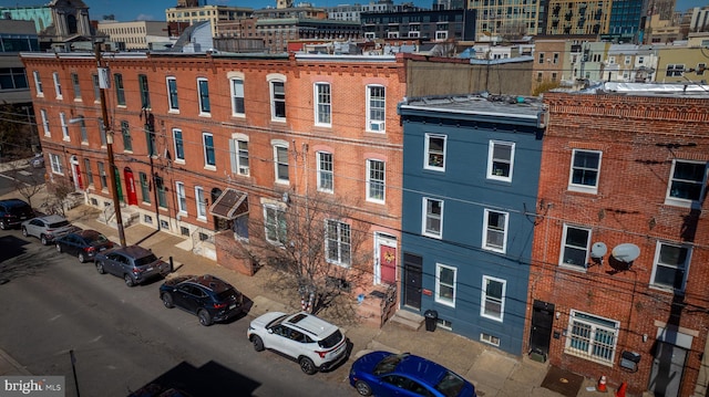 view of building exterior featuring a view of city