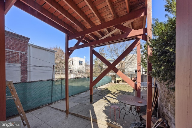 view of patio with fence