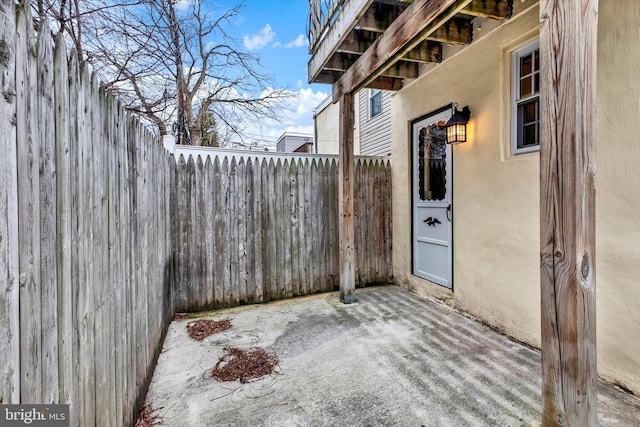 view of patio / terrace with fence