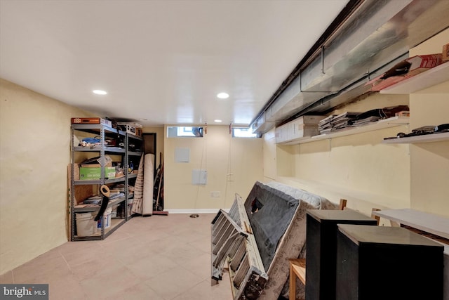 basement featuring recessed lighting