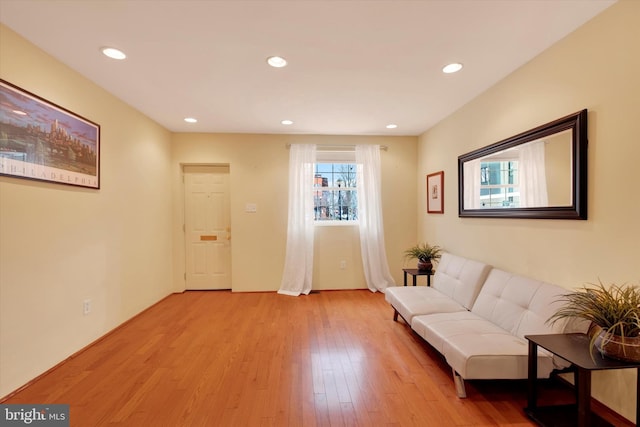 living area featuring recessed lighting and light wood-type flooring