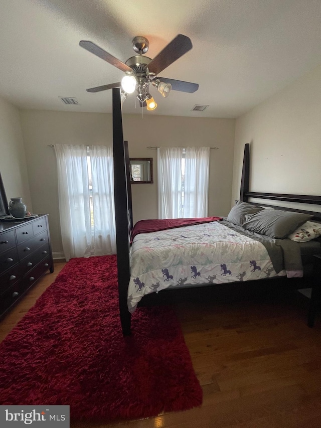 bedroom with visible vents and ceiling fan