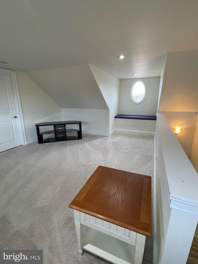 additional living space with vaulted ceiling, recessed lighting, carpet, and baseboards