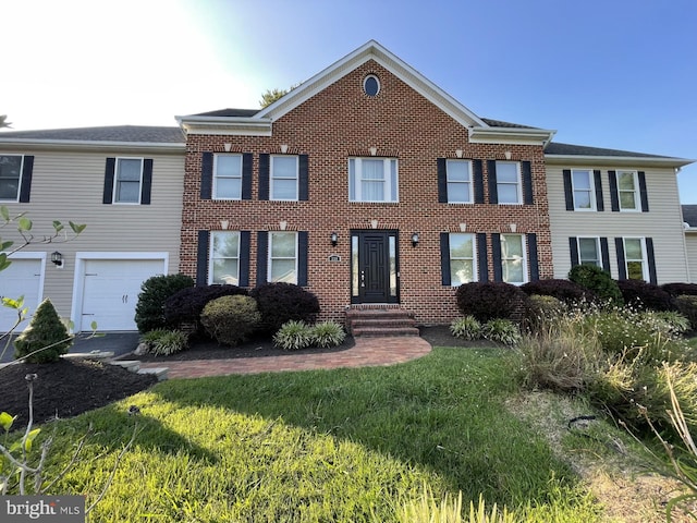 view of front of home featuring brick siding