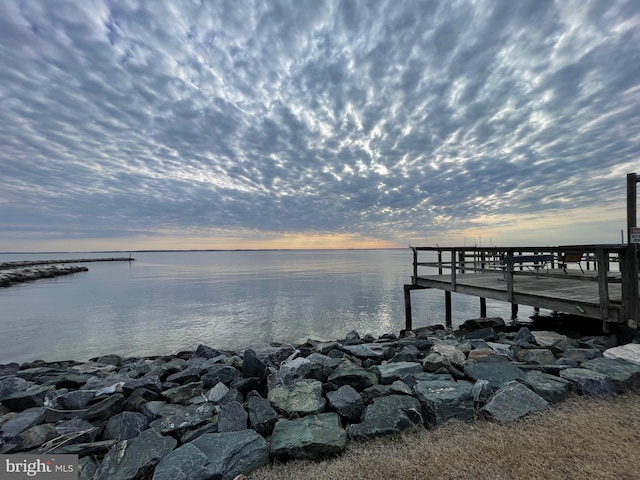 dock area featuring a water view