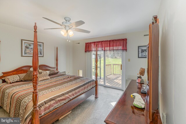 carpeted bedroom featuring access to exterior and ceiling fan