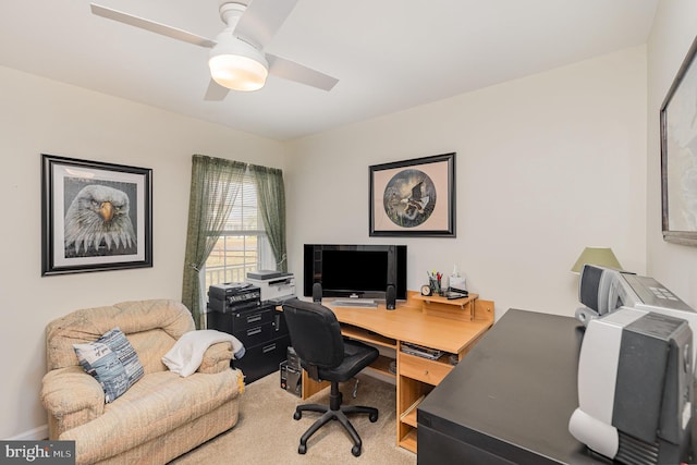 office area featuring carpet floors and ceiling fan