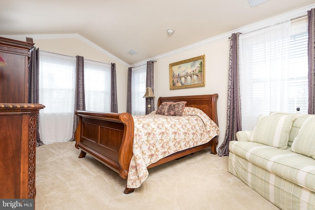 bedroom featuring vaulted ceiling, crown molding, and light carpet