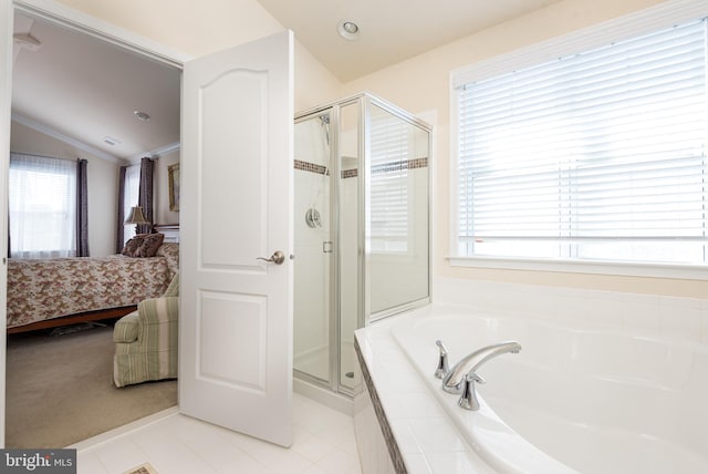 ensuite bathroom with a stall shower, vaulted ceiling, crown molding, ensuite bathroom, and a garden tub