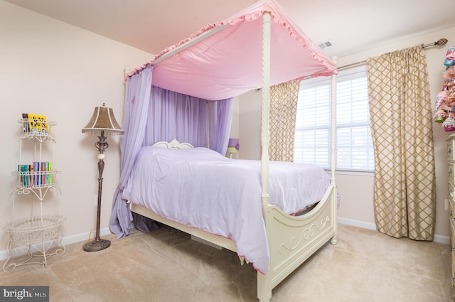 bedroom featuring carpet flooring, baseboards, and visible vents