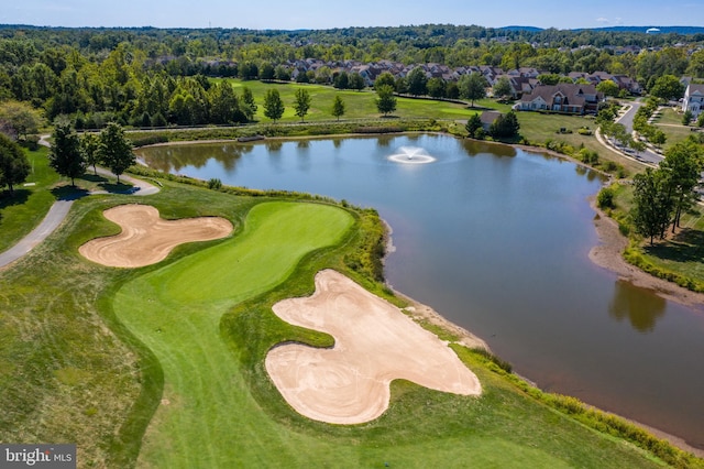 drone / aerial view featuring a water view and view of golf course