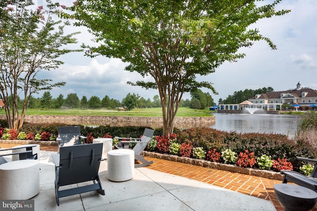 view of patio / terrace featuring a water view