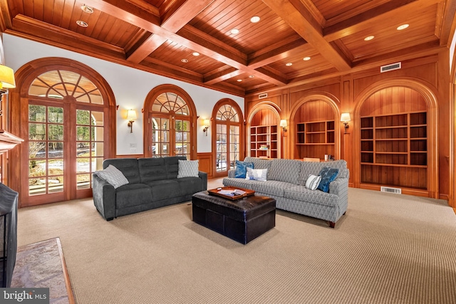 carpeted living room featuring wooden ceiling, built in features, and visible vents