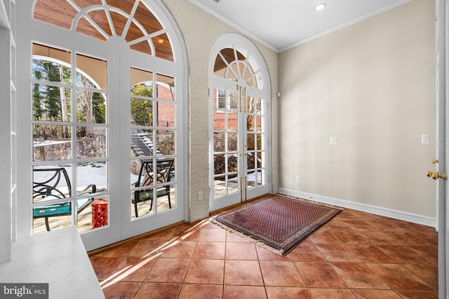 doorway featuring tile patterned floors, ornamental molding, recessed lighting, french doors, and baseboards