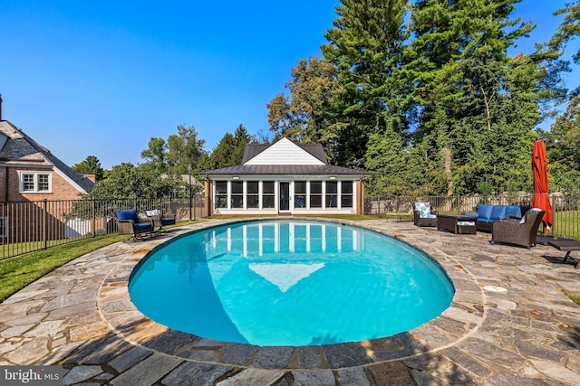 view of pool with a fenced in pool, an outdoor hangout area, a fenced backyard, and a patio area