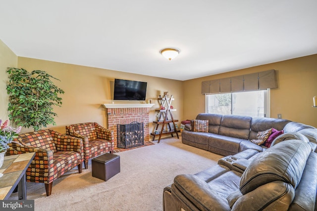 living area with carpet and a fireplace