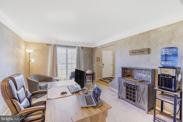 office area with baseboards, ornamental molding, carpet flooring, and a textured wall