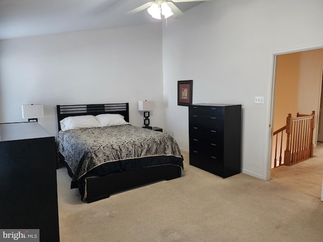 carpeted bedroom with baseboards and ceiling fan