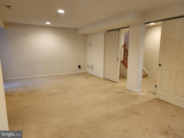 finished basement with stairs, baseboards, recessed lighting, and carpet flooring