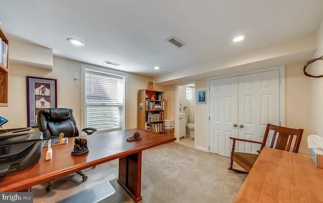 office area featuring recessed lighting, light colored carpet, and visible vents