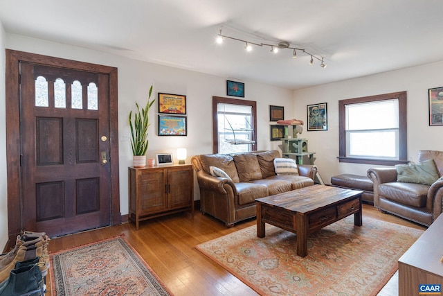 living area featuring light wood-style flooring