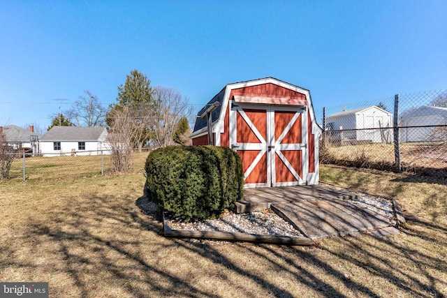 view of shed with fence