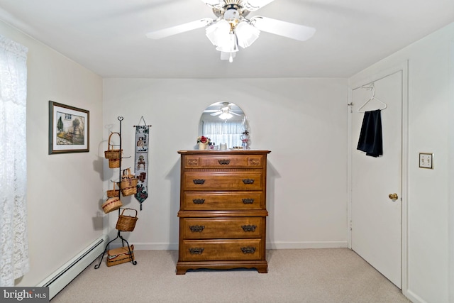 bedroom featuring a baseboard radiator, light carpet, and ceiling fan