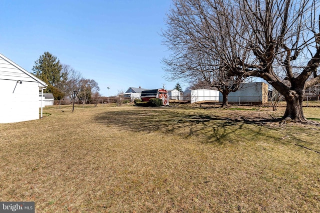 view of yard featuring fence