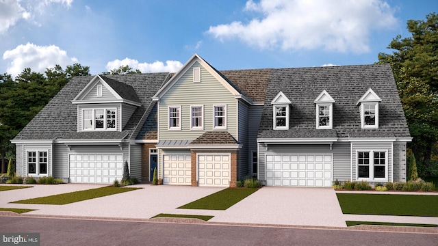 view of front facade with concrete driveway, a garage, and roof with shingles