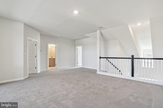 unfurnished room featuring recessed lighting, visible vents, carpet flooring, and baseboards