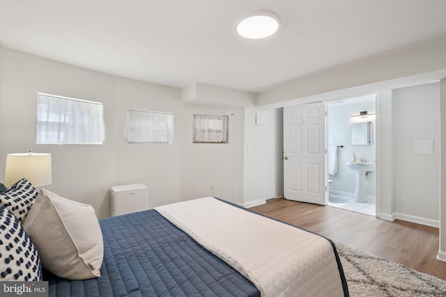 106 15th St SE, Washington, DC 20003 - bedroom with wood finished floors and ensuite bathroom